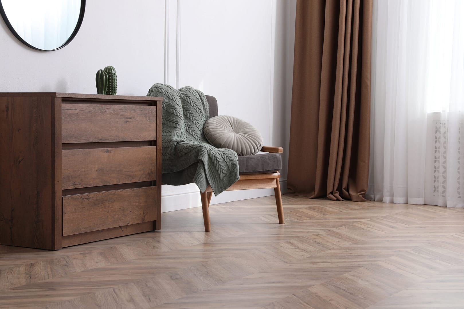 Contemporary living room adorned with parquet flooring and chic, modern furniture - Local Splash can help your flooring business showcase its commitment to quality through seamless flooring installation.