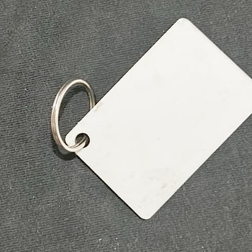 Key chains 3”x2” with colored tassle